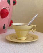 Vintage Pastel Yellow Gilded Cup Saucer Set